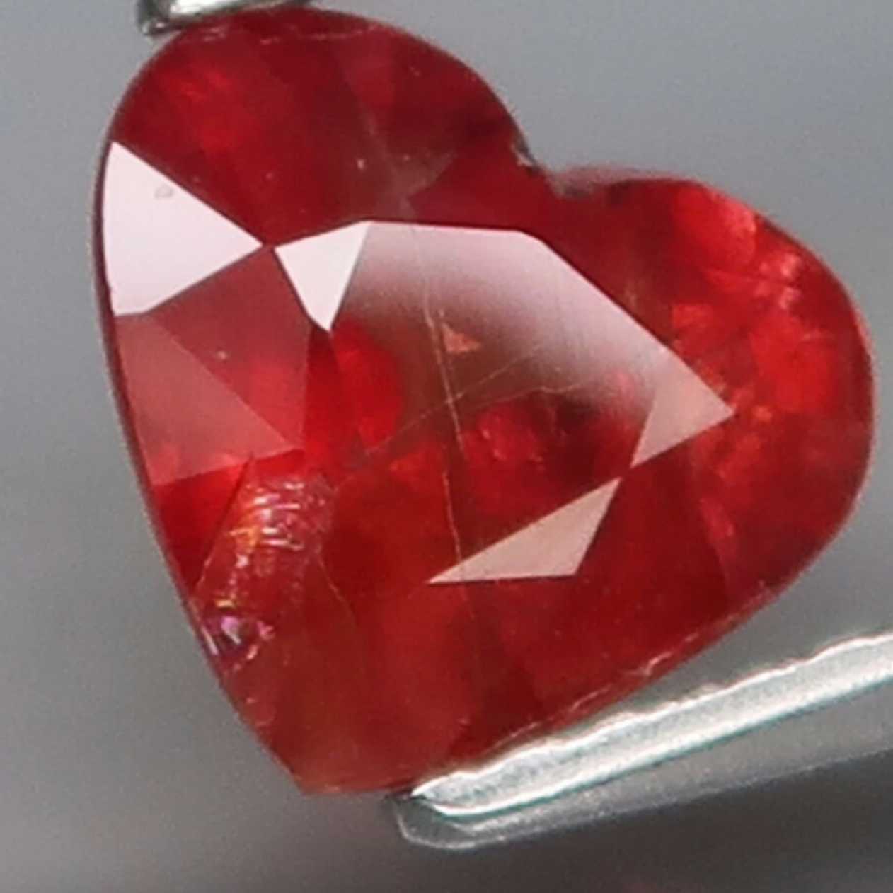 Tanzanian Ruby - 1.72 CT - Natural (Unheated Orange - Red Sapphire / Ruby). 7.8 X 6.9 X 4.3 mm