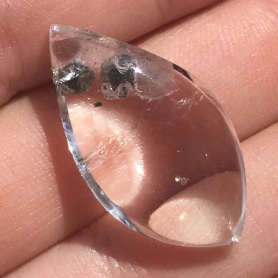 Suspended Axinite or Molybnite Inclusions In Water Clear Quartz 30.7 cts. 4512